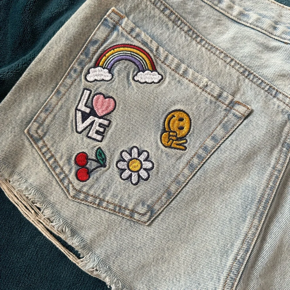 Aeropostale Blue Jean Shorts with Frayed Edges and Decorative Patches - Picture 2 of 5